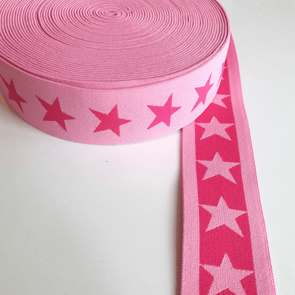 Elastikk stjerne 4 cm - Mørk rosa på mellomrosa